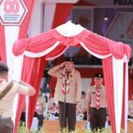 Kolaborasi untuk Membangun Ketahanan Bangsa, Ketua Mabida Pramuka Kalsel H. Muhidin Pimpin Apel Besar Hari Pramuka ke-64 di Tabalong
