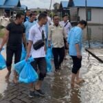 Disdag Kalsel Bersama BPSMB Salurkan Bantuan Kepada Korban Banjir di Desa Pematang Baru