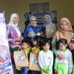 Hari Anak Nasional 2026, Disbunnak Kalsel Bagikan 231 Paket Makanan Bergizi untuk Anak