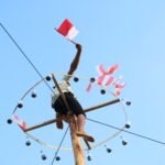 Lomba Panjat Pinang Aksi Merah Putih Meriahkan HUT ke-81 RI: Semangat Kebersamaan dan Gotong Royong Warga Tanah Bumbu